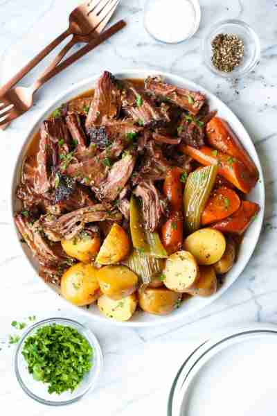 Slow Cooker Pot Roast - No-fuss, fall-apart pot roast made in your crockpot with the most tender veg...