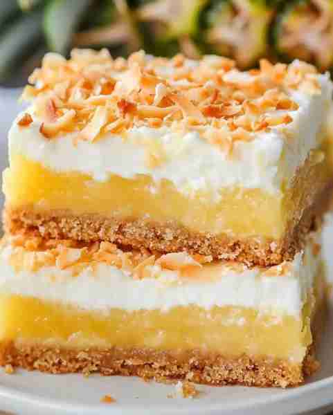 Hawaiian Pineapple Coconut Bars with Creamy Frosting Ingredients 1 1/2 cups all-purpose flour 1/2 cu...