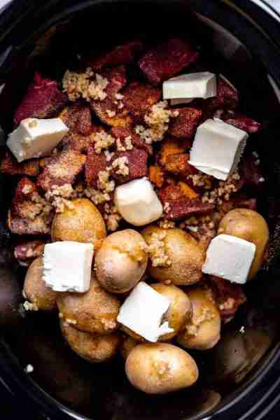 Slow Cooker Garlic Butter Beef Bites Ingredients 2 pounds beef stew meat 1 1/2 pounds baby Yukon gol...