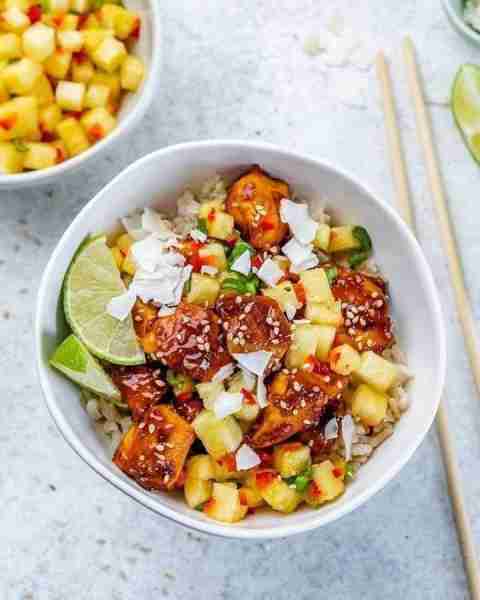 Pineapple Chicken Bowls are a BRIGHT meal idea! Besides being completely DELICIOUS, fresh Pineapple...