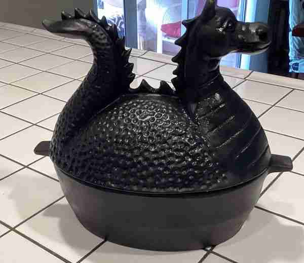 Look what I found at a garage sale. 12lb cast iron pot, never used!! Hoping my soup with steam out o...
