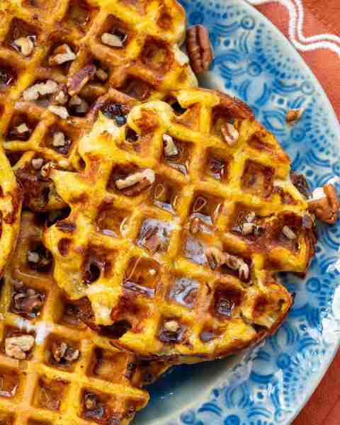 These Pumpkin Chaffles are a cozy fall twist on a keto classic. With less than 2 net carbs and nearl...