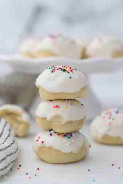 Anise Cookies are a traditional Italian Christmas cookie, glazed with icing and finished with a show...