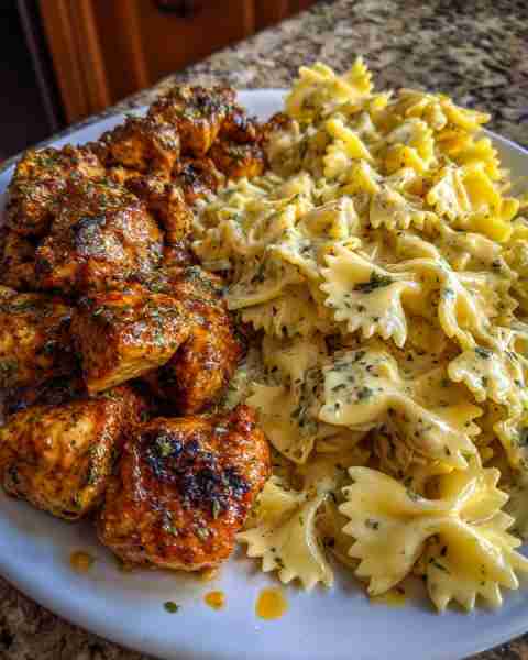 Cajun Garlic Butter Chicken with Bowtie in Velveeta Cream Ingredients: 1 pound boneless, skinless ch...