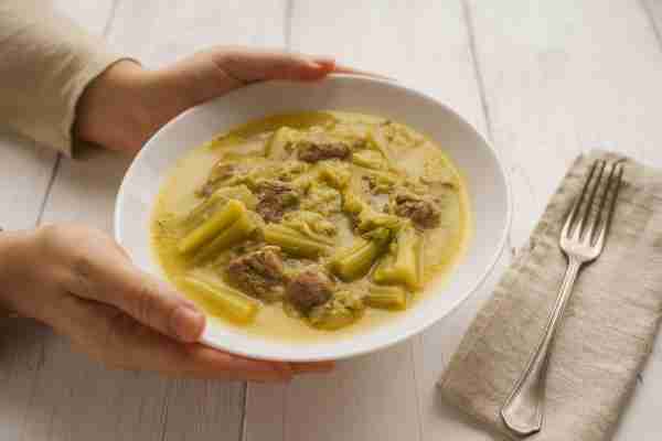 Greek comfort food at its best: Hoirino me Prasoselino. Tender pork with leeks and celery root, fini...