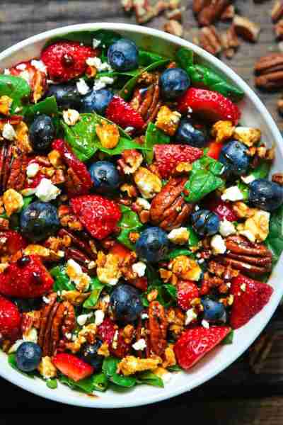Strawberry Spinach Salad with Blueberries, Pecans, Feta Cheese, and a Balsamic glaze. Recipe from Ju...