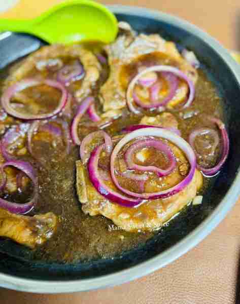 Pork Chop Steak with Onions Recipe: 2 pounds pork chip chops 5 cloves garlic minced 1 red onion- dic...
