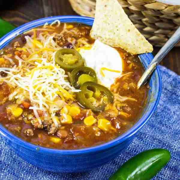 Full of Tex-Mex flavor, this easy Taco Soup is one of my favorite soup recipes. Top with cheese, sou...