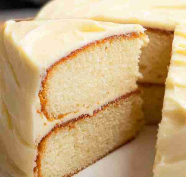 Vanilla Layer Cake with Frosting is a tender, flavorful cake with a rich vanilla taste, paired perfe...