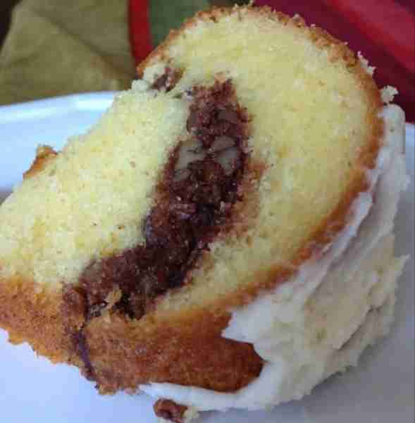 Sock It To Me Cake from scratch — rich, buttery, with that signature cinnamon–pecan swirl and a vani...