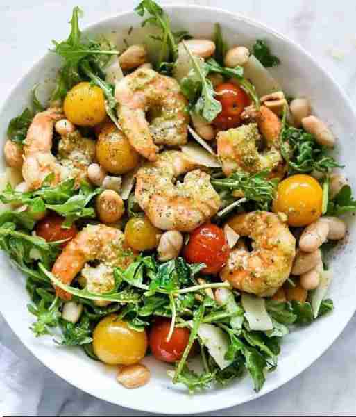 Arugula Salad with Pesto Shrimp, Parmesan and White Beans Thaw the shrimp in the refrigerator overni...