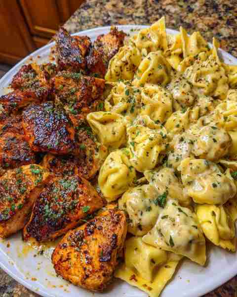 Cajun Alfredo Tortellini with Seared Chicken and Melted Mozzarella Ingredients: 1.5 lbs boneless, sk...