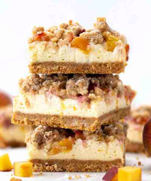 These Peach Cobbler Cheesecake Bars are dessert perfection! 🍑 Layers of juicy peaches, creamy chees...