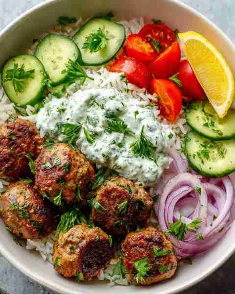🌿 Ultimate Mediterranean Meatball Rice Bowl with Tzatziki 🍋 Prep Time: 20 minutes Cook Time: 20 mi...