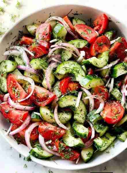 Dilled Cucumber and Tomato Salad This extra fresh, dilled cucumber and tomato salad is a low-effort...
