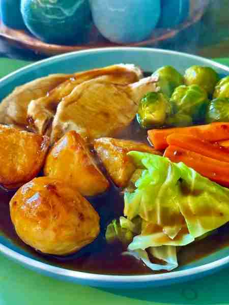 A Monday roast.. Pork, carrots, cabbage, Brussels & crispy potatoes. Apple sauce was added after I t...