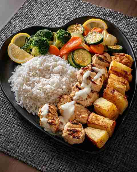 Perfect for cozy nights —🍋 Grilled Chicken Platter with Rice, Roasted Potatoes & Lemon Veggies