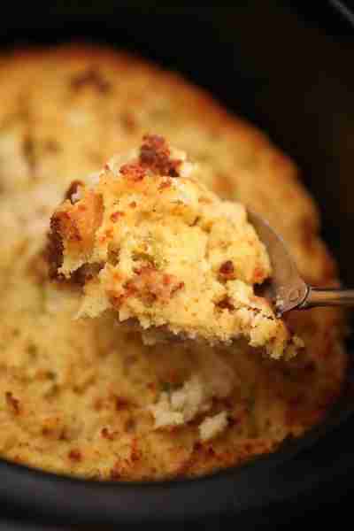 Free up oven space and STILL get that golden‑edge goodness — this Slow Cooker Cornbread Dressing is...