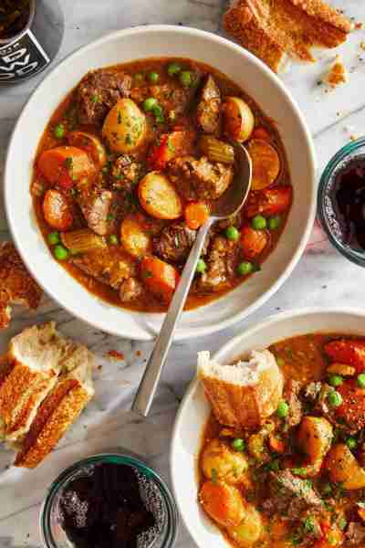 Instant Pot Beef Stew - Loaded with flavorful chunks of meat + potatoes that come out amazingly tend...