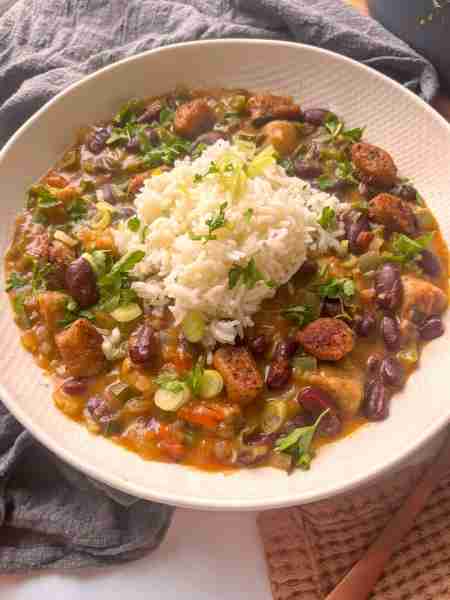 Try this delicious vegetarian cajun red beans and rice recipe - an absolute classic and packed with...