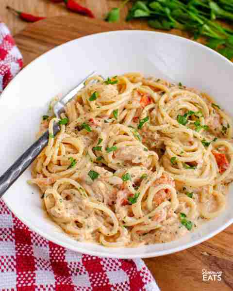 Seafood Lovers reunite for this Spicy Creamy Crab, Chilli and Cherry Tomato Pasta – a true flavour e...