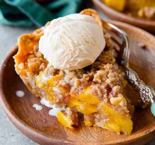 Just pulled this Brown Sugar Peach Crumble Pie out of the oven, and my kitchen smells like a sweet s...