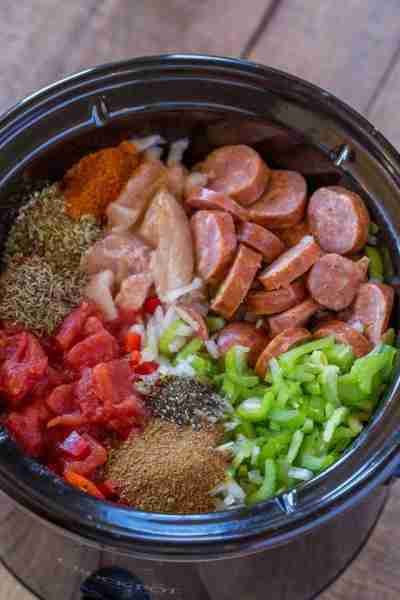 Slow Cooker Jambalaya Slow Cooker Jambalaya with andouille sausage, chicken and shrimp cooked low an...