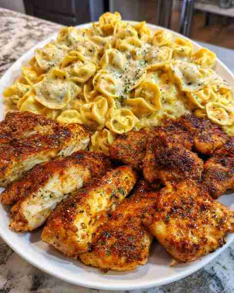 I made Cheesy Garlic Cajun Chicken Tortellini with Velveeta Cream for dinner, and it was so good! Ju...