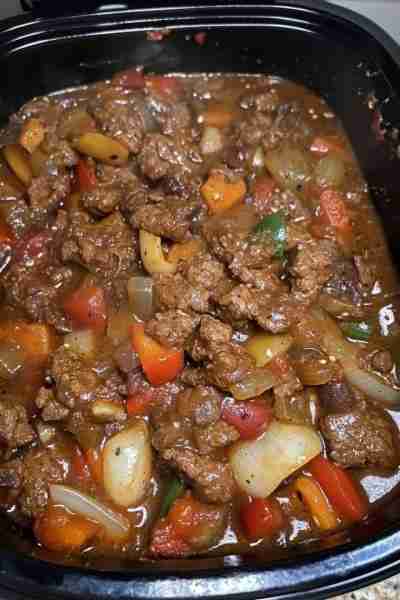 "I’ve never been more obsessed with my crockpot. One bite of this and you’ll understand why." Full r...