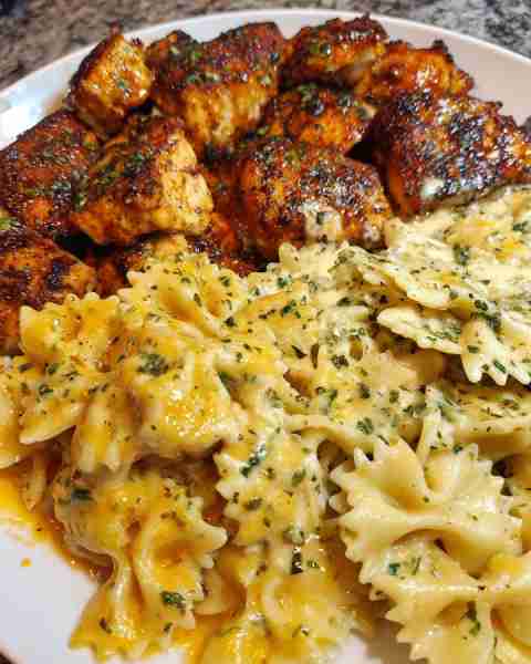 Velveeta Garlic Cajun Chicken Bowtie Pasta Alfredo Ingredients: 1 pound bowtie pasta 2 tablespoons o...