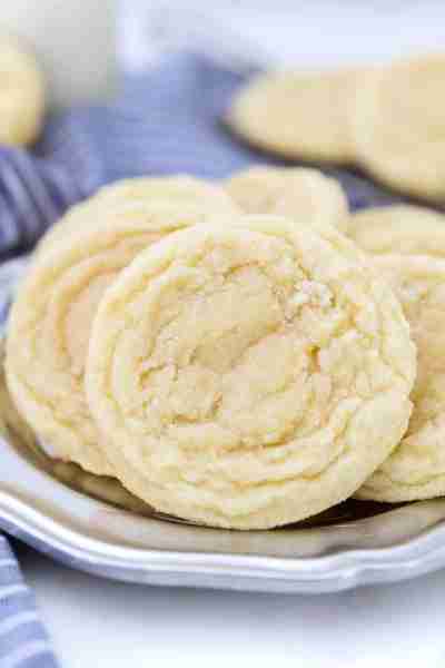 Easy Sugar Cookies are a simple alternative to cut-out sugar cookies! Decorate them with icing or sp...