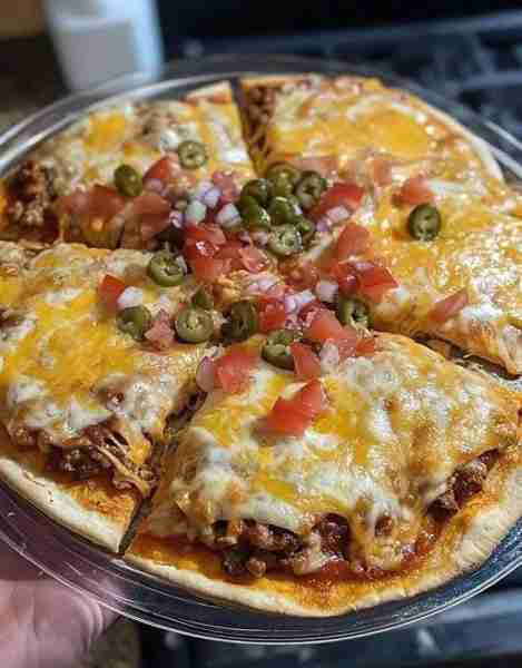 Homemade Taco Bell’s Mexican Pizza, it was delicious and only 4 points for an entire 8 inch pizza!😋...