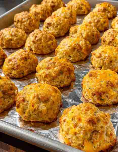 The BEST Sausage Balls Ingredients: 1 pound ground sausage 2 cups baking mix 4 cups shredded chedd...