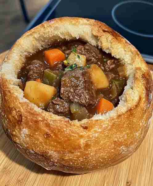 "My mom's Beef Stew in a Bread Bowl is a family favorite. She pours her love into every spoonful, ma...