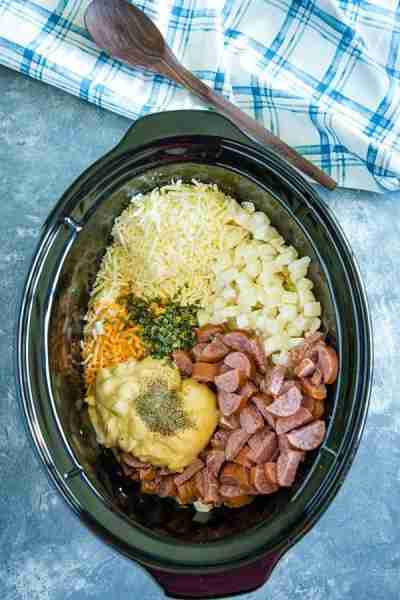 Cheesy Slow Cooker Smoked Sausage Potatoes Ingredients 32 ounces frozen diced potatoes thawed in ref...