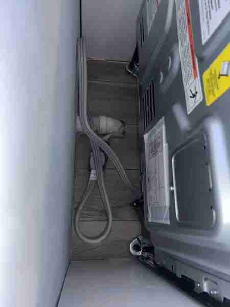 Slide in range won’t go all the way back There is a drainage pipe for our laundry room when to stove...