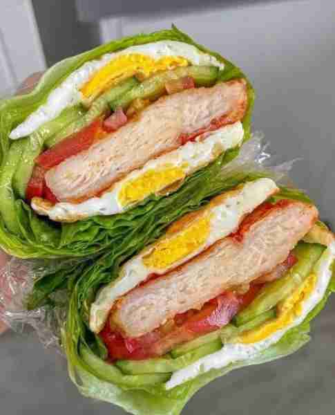 Lettuce-Wrapped Chicken & Egg Sandwich Ingredients: 2 large chicken breasts (grilled or pan-seared)...