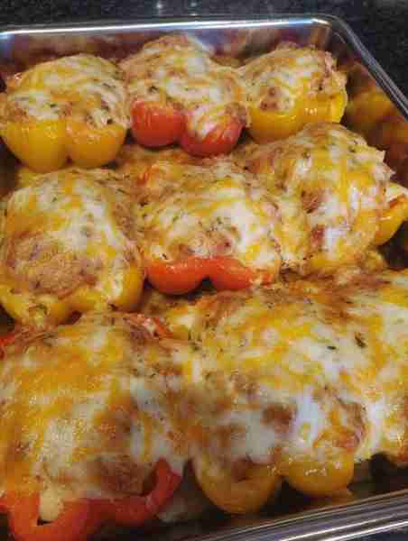 Keto Stuffed Bell Peppers with Cheese Ingredients 4 large bell peppers (halved, seeds removed) 1 lb...