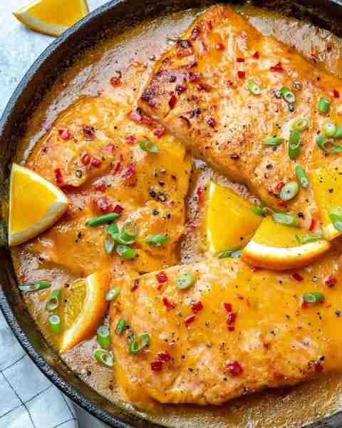 Sweet + Spicy Saucy Orange Salmon will surely bring smiles to your dining table! ❤ Serve over brown...