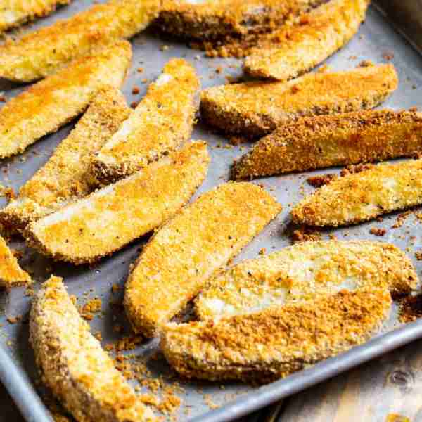 A packet of Ranch Dressing Mix, grated Parmesan cheese, and bread crumbs really flavor up some potat...