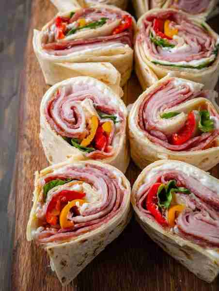 Salami, pepperoni, cheese, and that zingy dressing… If you're a fan of the classic hoagie, these bit...