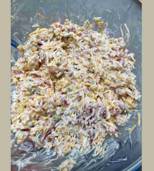 Southwest Corn Dip 1 can Rotel 1 can southwest corn Half cup Mayo Half cup sour cream 8 ounce shredd...