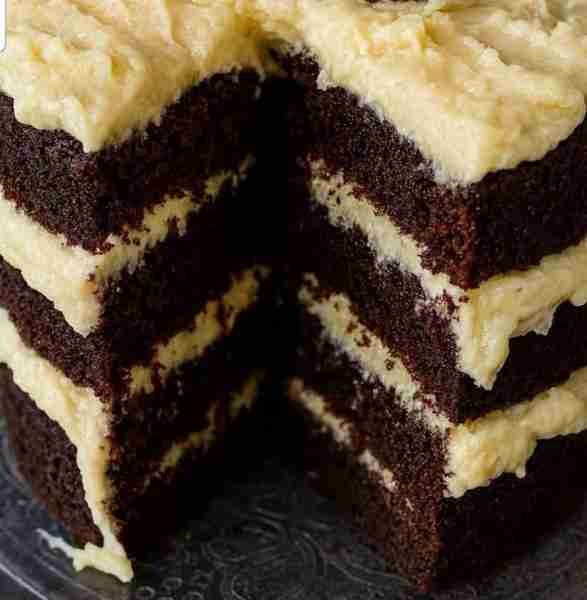 Four-Layer Chocolate Coconut Cake Ingredients For the Cake 2 cups all-purpose flour 2 cups granulate...
