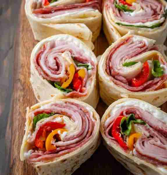 Salami, pepperoni, cheese, and that zingy dressing… If you're a fan of the classic hoagie, these bit...