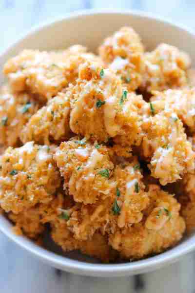 Bang Bang Chicken - Amazingly crisp chicken bites drizzled with sweet chili mayo - so good, you'll w...