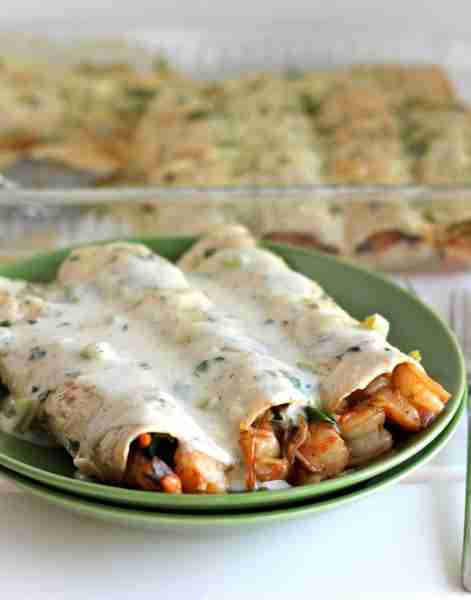 Roasted Shrimp Enchiladas with Jalapeño Cream Sauce - Smothered in a rich, jalapeño cream sauce, how...