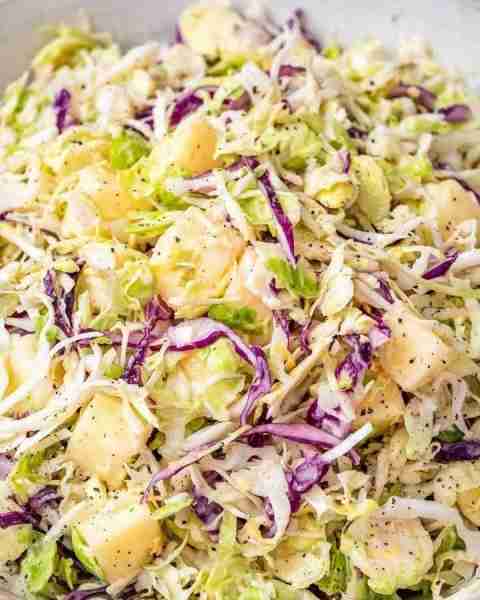 Delicious and nutritious Brussels Sprout Apple Coleslaw is packed with fiber-rich cabbage, Brussels...