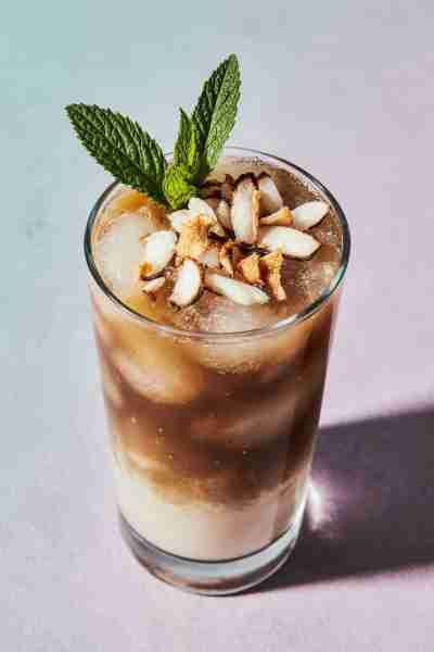 Coconut Iced Coffee Recipe Cool down with a tropical twist on iced coffee, made with coconut milk an...