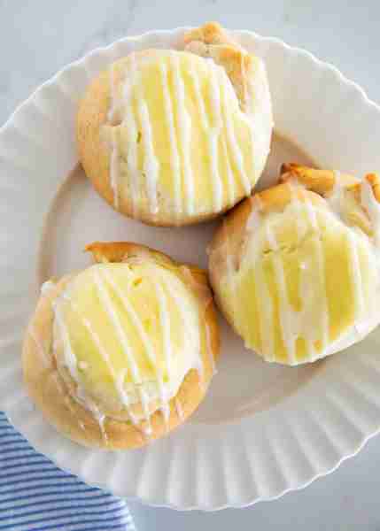 Crescent roll cream cheese Danish made with a sweet cream cheese filling encased by flaky pastry and...