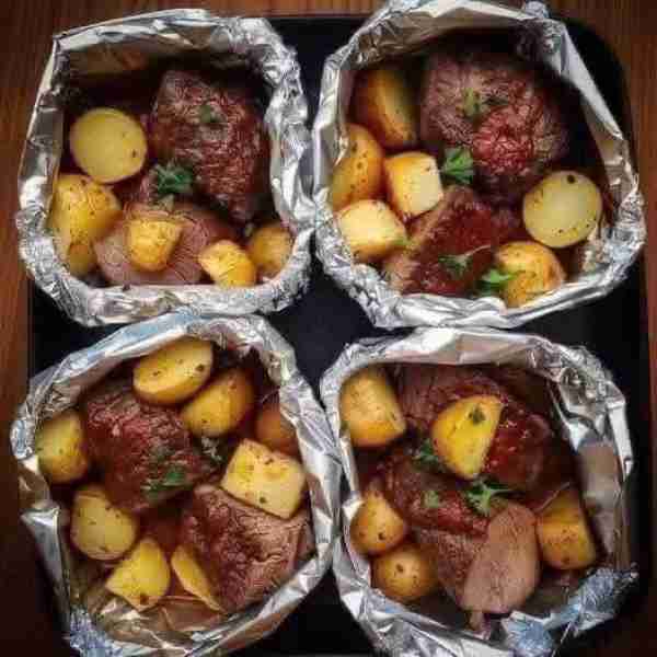 My hubby begs me to make this recipe at least once per week.Garlic Butter Steak and Potato Foil Pack...